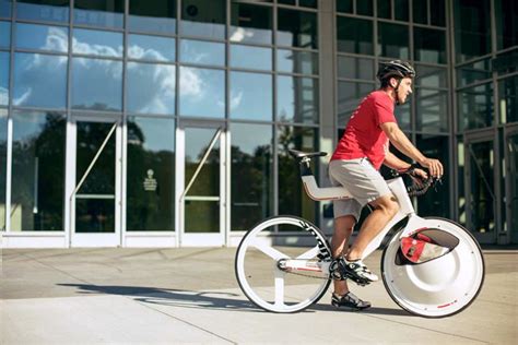 Reinventing The Hubless Wheel Transport Is A Trunk For Your Bike