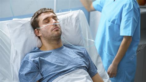 Sick Patient Sleeping In A Hospital Bed Stock Image F0333163
