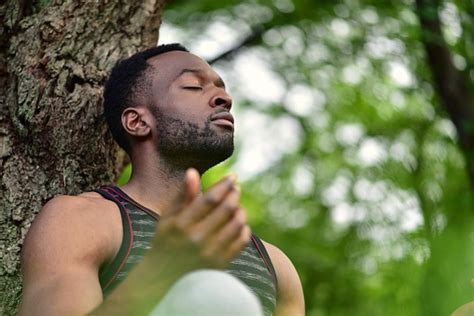 Young Man Meditating Stock Photo Download Image Now Istock