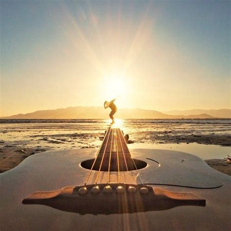 Guitar On The Beach Guitar Art Music Guitar Playing Guitar Music