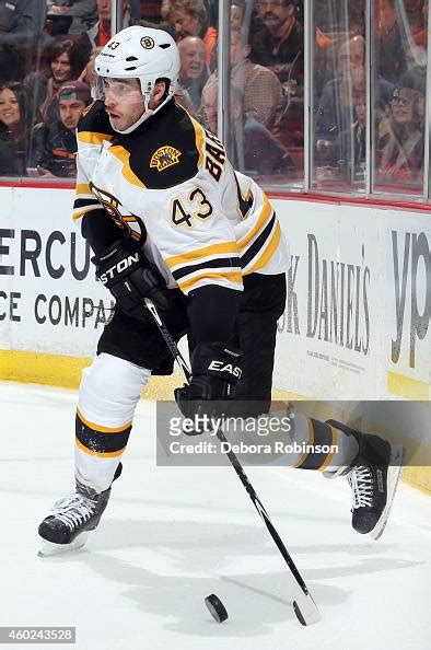 Matt Bartkowski Of The Boston Bruins Handles The Puck Against The