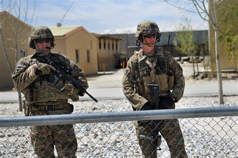 Us Soldiers Provide Security While Us Marines Train Afghan Military