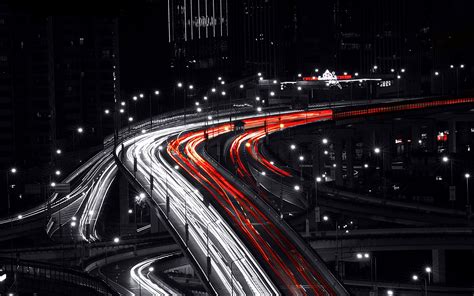 Time Lapse Photography Of Vehicle Moving On Road Black Red White