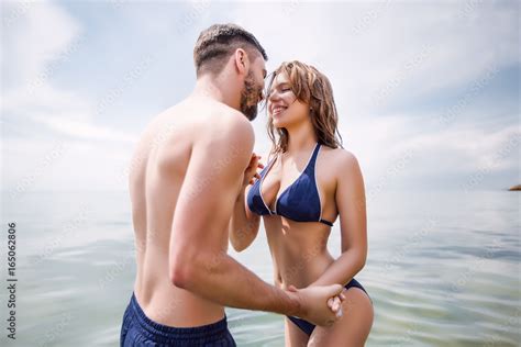 Sexy Couple At Seaslim Bodylong Hairswimwearswimsuitbeautiful Tansummer Holidays Concept