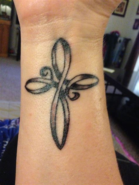 Rose wrist tattoos, cross wrist tattoos. Pin on Tattoos, piercings, etc.