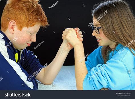 Young Boy Girl Having Arm Wrestle Stock Photo 1039194280 Shutterstock