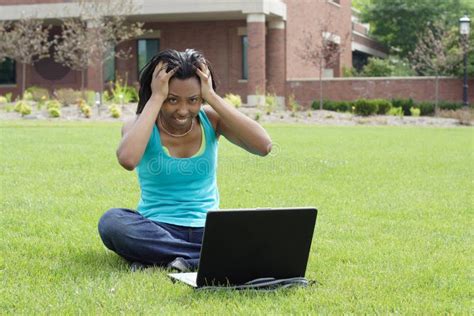 Stressed Beautiful Female African American College Student On Campus