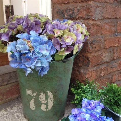 Hydrangeas are excellent for a range of garden sites from group plantings to shrub borders to how to use hydrangeas in a bouquet. faux hydrangea stems by violette | notonthehighstreet.com