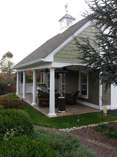 Garages are as versatile in function as they are in design. Pool House and Garage - Traditional - Patio - New York ...
