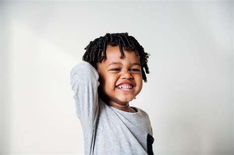 Premium Photo Portriat Of Young Cheerful Black Boy