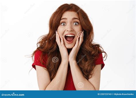 Excited And Surprised Redhead Woman Scream From Amazement Looking