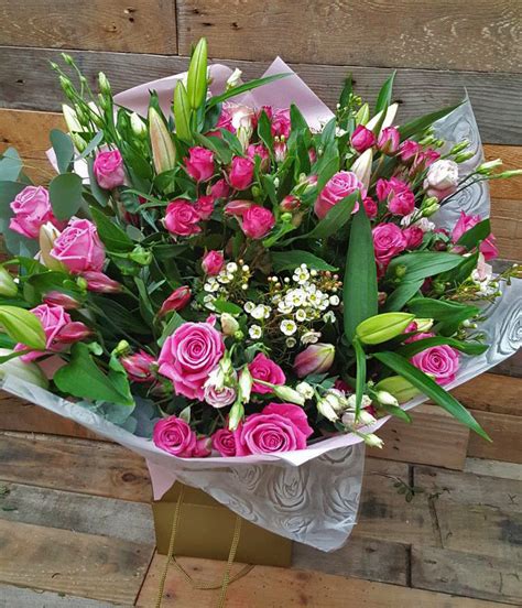The Perfect Pink And Green Bouquet With A Touch Of White Flowers
