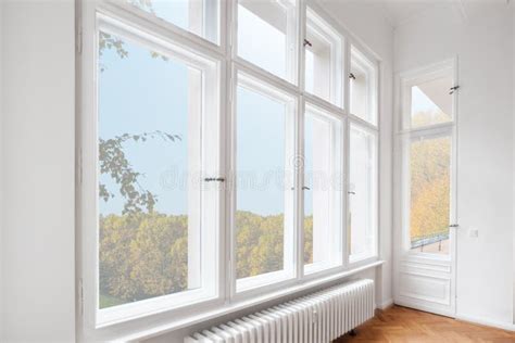 Big Wooden Windows In Apartment Room Of Old Building Stock Photo