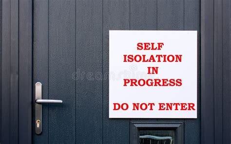 Coronavirus Self Isolation Sign Outside A Front Door In England Stock