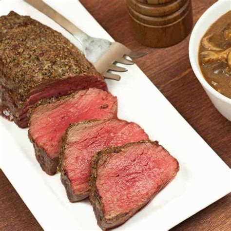 Place meat in shallow baking pan, and pour marinade over it. Roasted Beef Tenderloin with Mushroom-Port Sauce Recipe ...