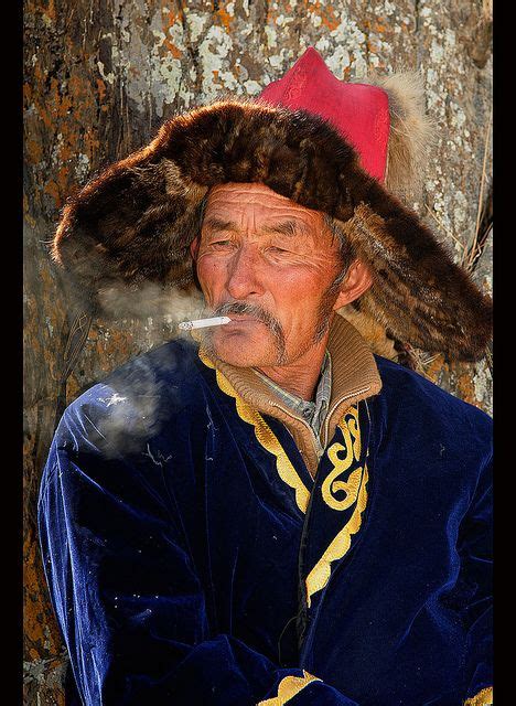 Portrait Of A Kazakh Eagle Hunter In The Altai Region Of Bayan Ölgii In