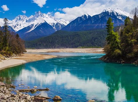 Snow Mountain Clear Green River Landscape Of Valley Stock Image