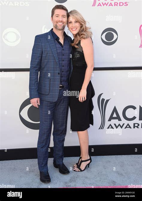 josh turner left and jennifer ford arrive at the 52nd annual academy of country music awards