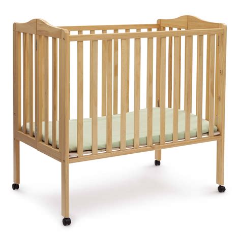 Delta Children Folding Portable Mini Crib With Mattress Natural