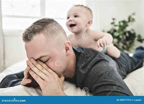 Tired Father Sleep But His Baby Boy Interferes Him Young Happy Father