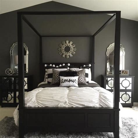 Stripe textured and dark silver bedding set gives the modern and clean look in this bedroom. Grey and black bedroom design | Hawk Haven