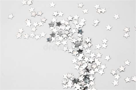 Sparkles Silver Stars On White Background With Text Place Image Stock