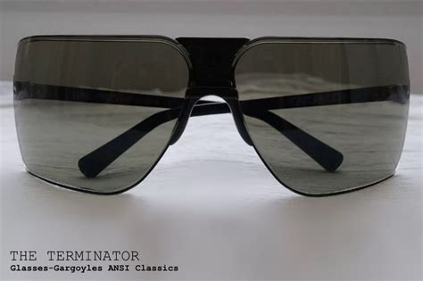A Pair Of Sunglasses Sitting On Top Of A Table
