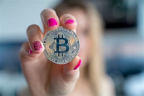 Young Girl Holding A Bitcoin Coin In Her Hand Stock Image Image Of