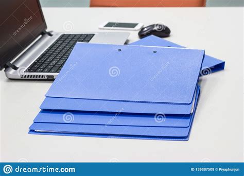 Blue File Folder With Documents On The White Table Stock Image Image