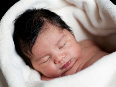 What You Need To Know About Babies Born With Hair