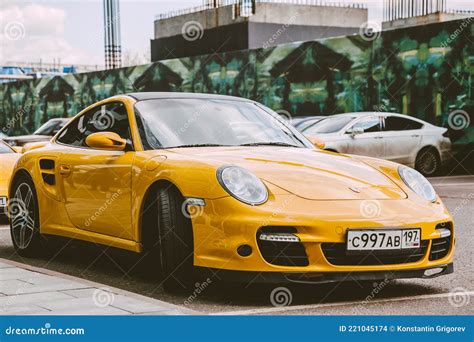 Yellow Porsche 997 Turbo Car Parked On The Street In The City Porsche