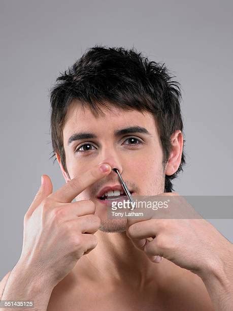 Man Trimming Nose Hair Photos And Premium High Res Pictures Getty Images