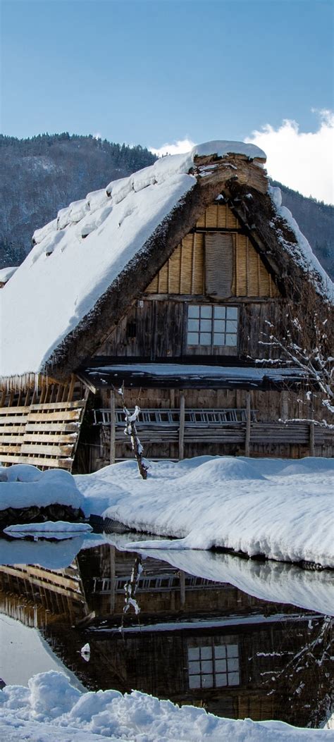 720x1600 Japan Village Covered In Winter Snow 720x1600 Resolution