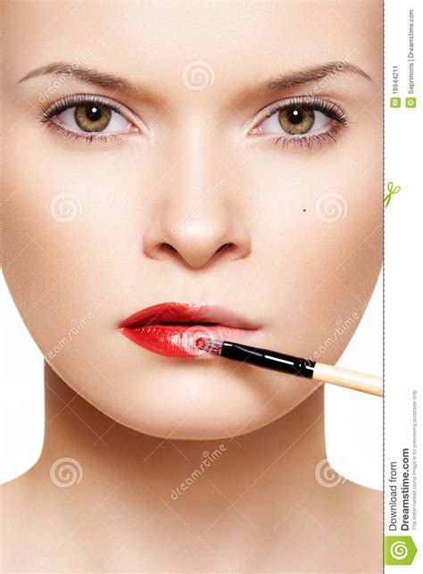 Lips Make Up Applyng Red Lipstick Using Lip Brush Stock