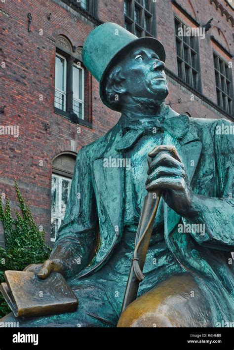 Bronze Seated Statue Of Hans Christian Andersen Holding A Book
