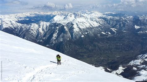Alpinist Reaching The Summit Of The Mountain Del Colaborador De Stocksy Sky Blue Creative