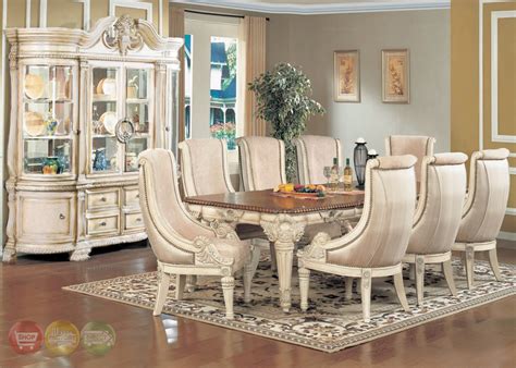 This dining room is a bit more traditional, with upholstered head chairs paired with side chairs that have a rustic vibe. Antique White Dining Room Set | Formal Dining Room ...