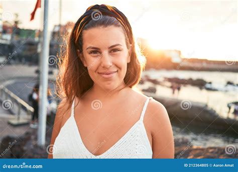 Beautiful Young Woman Walking On Beach Promenade Enjoying Ocean View Smiling Happy On Summer