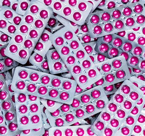 Premium Photo Pile Of Round Pink Tablets Pill In Blister Pack