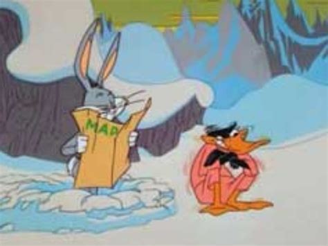 An Animated Image Of Two Rabbits In The Snow With One Holding A Box And