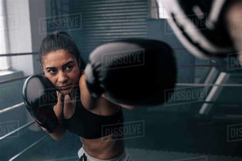 Boxer Practicing Her Punches At A Boxing Studio Close Up Of A Female