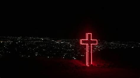 Red Light Cross Above The City Backiee