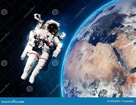 Astronaut In Outer Space Against The Backdrop Of Editorial Stock Photo