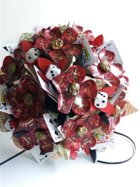 Maybe you would like to learn more about one of these? Rock 'n' Roll love's a gamble Guitar pick flower bouquet ...