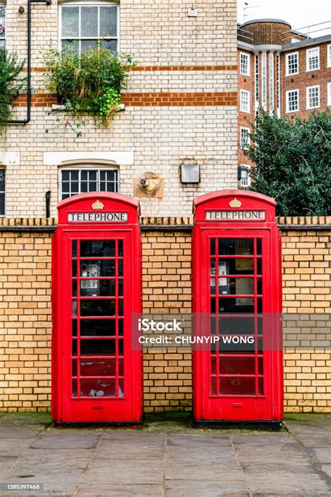 Victorian Apartments Behind The Iconic British Telephone Booth In