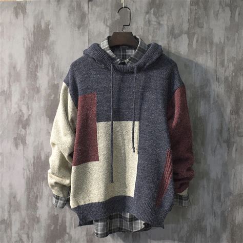 For A Casual Addition To Any Look The Long Baggy Knitted Hoodie Is A