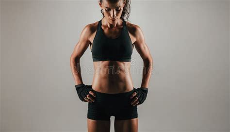 Abdominal Muscles Of Woman Over Gray Background Stock Photo Image Of