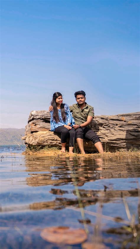 couple posing in the river free image by murlidhar chakradhari on