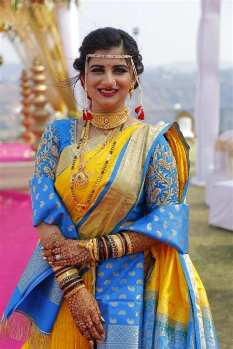 Maharashtrian Bride In Yellow Nauvari With Blue Custom Blouse Yellow Wedding Nineyards