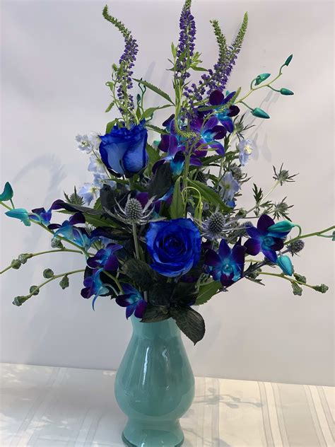 Local san francisco flowers are an option as well, thanks to the moderate temperatures and rolling hills near the coasts. Teal, Blue Floral arrangement. W663 in San Francisco, CA ...